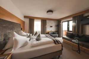Posteľ alebo postele v izbe v ubytovaní Garni Hotel Platzer