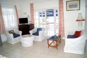 Predel za sedenje v nastanitvi 3 bedrooms appartement with balcony and wifi at Bambous 6 km away from the beach