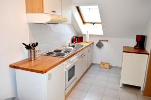 Kuchyň nebo kuchyňský kout v ubytování Ferienwohnung Klaus