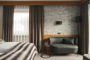 Posteľ alebo postele v izbe v ubytovaní Garni Hotel Platzer