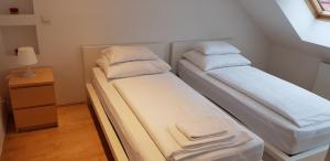 Posteľ alebo postele v izbe v ubytovaní Vienna-apartment-one Schmidgasse