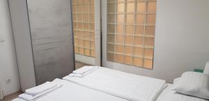 Posteľ alebo postele v izbe v ubytovaní Vienna-apartment-one Schmidgasse