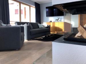 A seating area at Chalet Bergzeit
