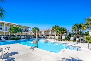 The swimming pool at or close to Crystal Beach Townhomes