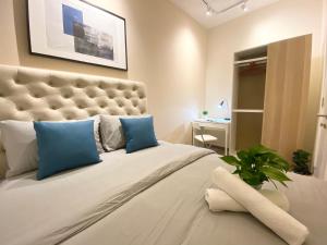 Giường trong phòng chung tại 3BR Near Desa Park City MONT KIARA