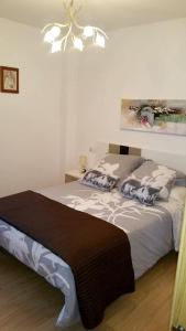 Posteľ alebo postele v izbe v ubytovaní Charming Apartment in Riveira with Private Parking