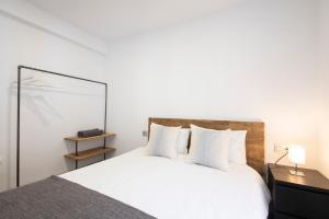 Postel nebo postele na pokoji v ubytování San Juan Guesthouse
