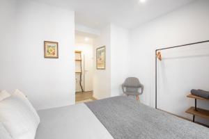 Postel nebo postele na pokoji v ubytování San Juan Guesthouse