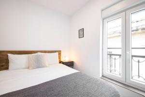 Postel nebo postele na pokoji v ubytování San Juan Guesthouse