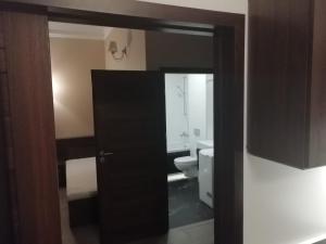Łazienka w obiekcie Aparthotel Łódź 55 Piotrkowska