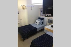 Ein Bett oder Betten in einem Zimmer der Unterkunft Villa Gala
