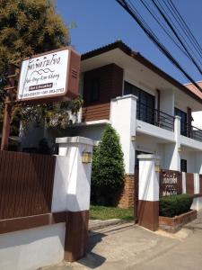 a house with a sign in front of it at Pak Ping Rim Khong in Chiang Saen