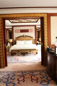 다이너스티 인터내셔널 호텔 다롄 객실 침대