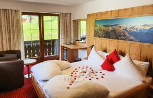 Ein Sitzbereich in der Unterkunft Alpenhotel Denninglehen
