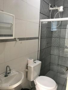 Een badkamer bij Kitnets da vana