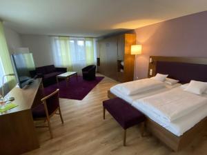 Postel nebo postele na pokoji v ubytování Gasthaus Hotel Kranz