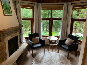 Posezení v ubytování Pousada Opas Haus