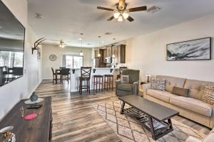 a living room with a couch and a table at Pet-Friendly Retreat - 1 Block to Colorado River! in Bullhead City