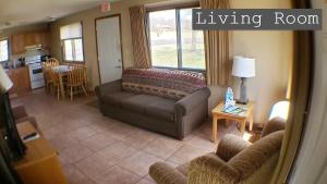 a living room with a couch and a living room at Lewis & Clark Resort in Yankton