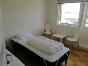 Postel nebo postele na pokoji v ubytování Lofoten Villa