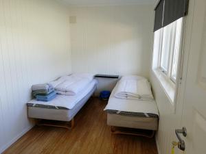 Postel nebo postele na pokoji v ubytování Lofoten Villa
