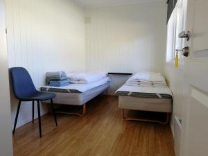 A bed or beds in a room at Lofoten Villa