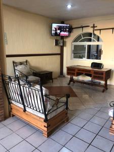 TV a/nebo společenská místnost v ubytování Casa De Rey