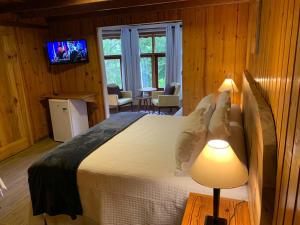 Postel nebo postele na pokoji v ubytování Pousada Opas Haus