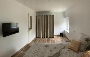 Säng eller sängar i ett rum på Belle Villa 6 pers 2h espace bien-être privatisé inclus 80 m2 de détente garantie