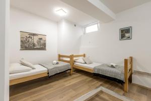 Postel nebo postele na pokoji v ubytování HVAR CENTRAL APARTMENT