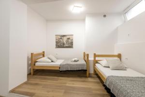 Postel nebo postele na pokoji v ubytování HVAR CENTRAL APARTMENT