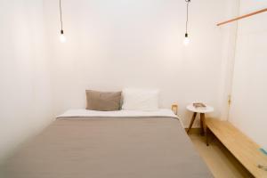 Postel nebo postele na pokoji v ubytování Joy Hotel Phú Yên