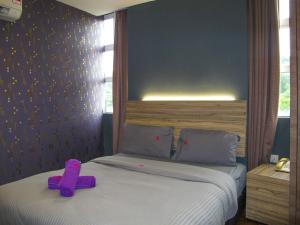 Postel nebo postele na pokoji v ubytování Classical Boutique Hotel