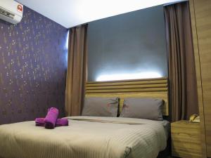 Postel nebo postele na pokoji v ubytování Classical Boutique Hotel