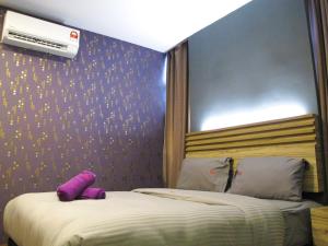 Postel nebo postele na pokoji v ubytování Classical Boutique Hotel