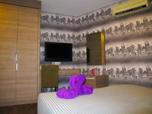 Postel nebo postele na pokoji v ubytování Classical Boutique Hotel