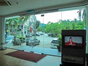 TV a/nebo společenská místnost v ubytování Classical Boutique Hotel