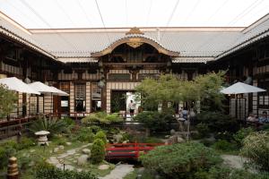 a building with a garden in front of a building at Hollywood Hills Hotel in Los Angeles +37 photos