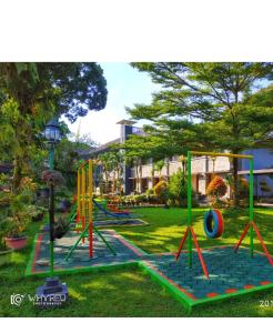 un parco giochi con scivolo di Hotel Bahtera PT.Pelni a Bogor