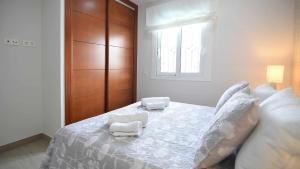 Posteľ alebo postele v izbe v ubytovaní Villa Garcia Jaime Casitas Select