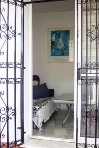 Coin salon dans l'établissement One bedroom apartement with city view terrace and wifi at Sevilla