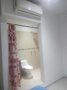 Koupelna v ubytování Mi Hotel Club