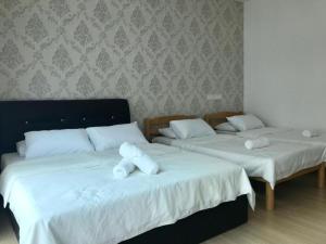 Postel nebo postele na pokoji v ubytování Island Hostel Bayan Lepas Airport