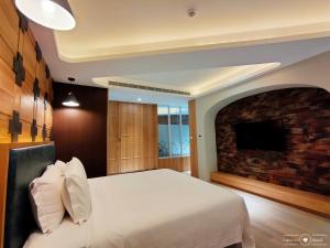 Letto o letti in una camera di 浪琴Motel文創旅館
