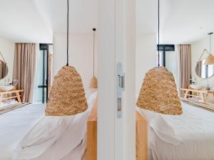 Кровать или кровати в номере Cumeja Beach Club & Hotel