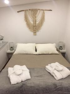 Uma cama ou camas num quarto em Casa Porta de Santiago