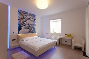 Postel nebo postele na pokoji v ubytování Villa Vizula + 37 fotografií