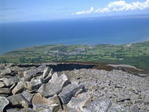 a view from the top of a mountain with rocks at Pen Llyn Quarryman's Cottage in Trevor