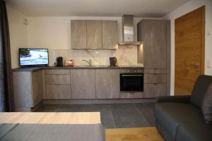 Η κουζίνα ή μικρή κουζίνα στο M4 Appartements +186 φωτογραφίες