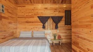 Postel nebo postele na pokoji v ubytování Joy House Sapa + 37 fotografií